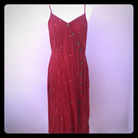 red dress with buttons down the front
